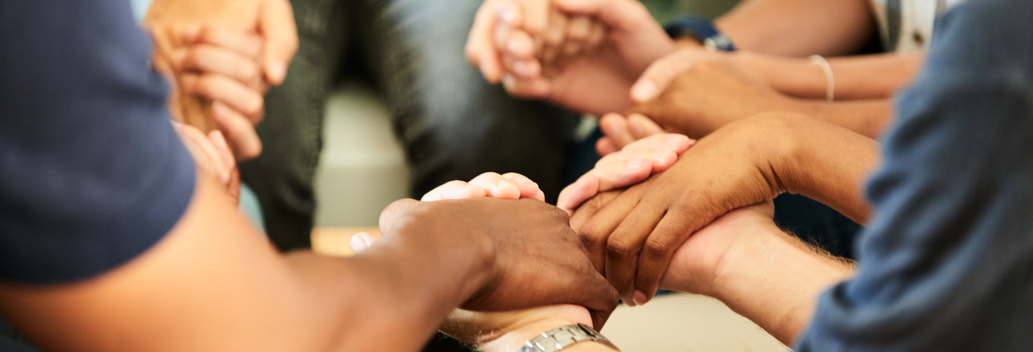 Hands together, praying.