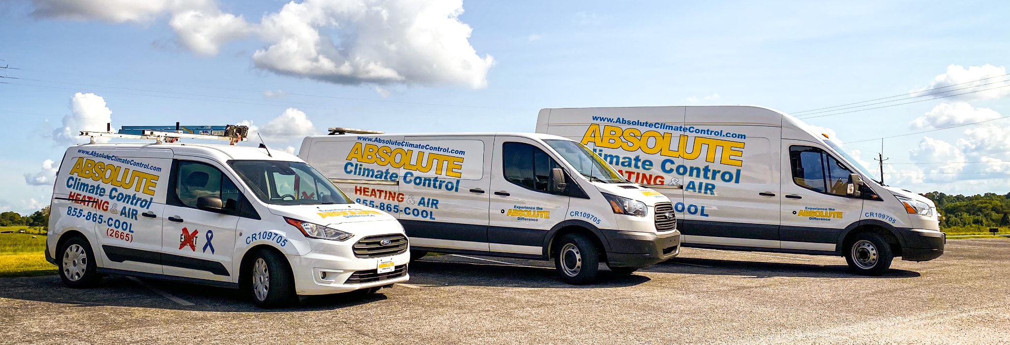 Absolute Climate Control service vehicles at office in Gainesville, GA.